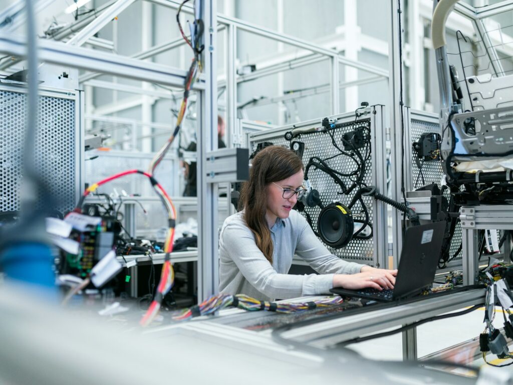 Engineer working on a laptop at a desk