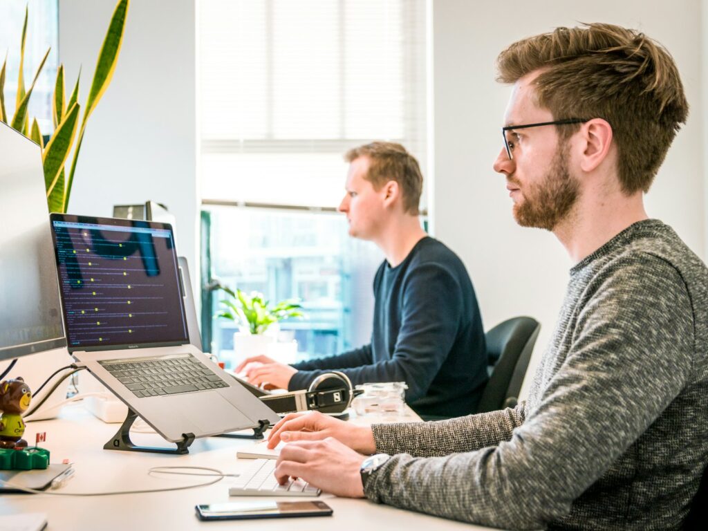 Staff working at desks in a modern office
