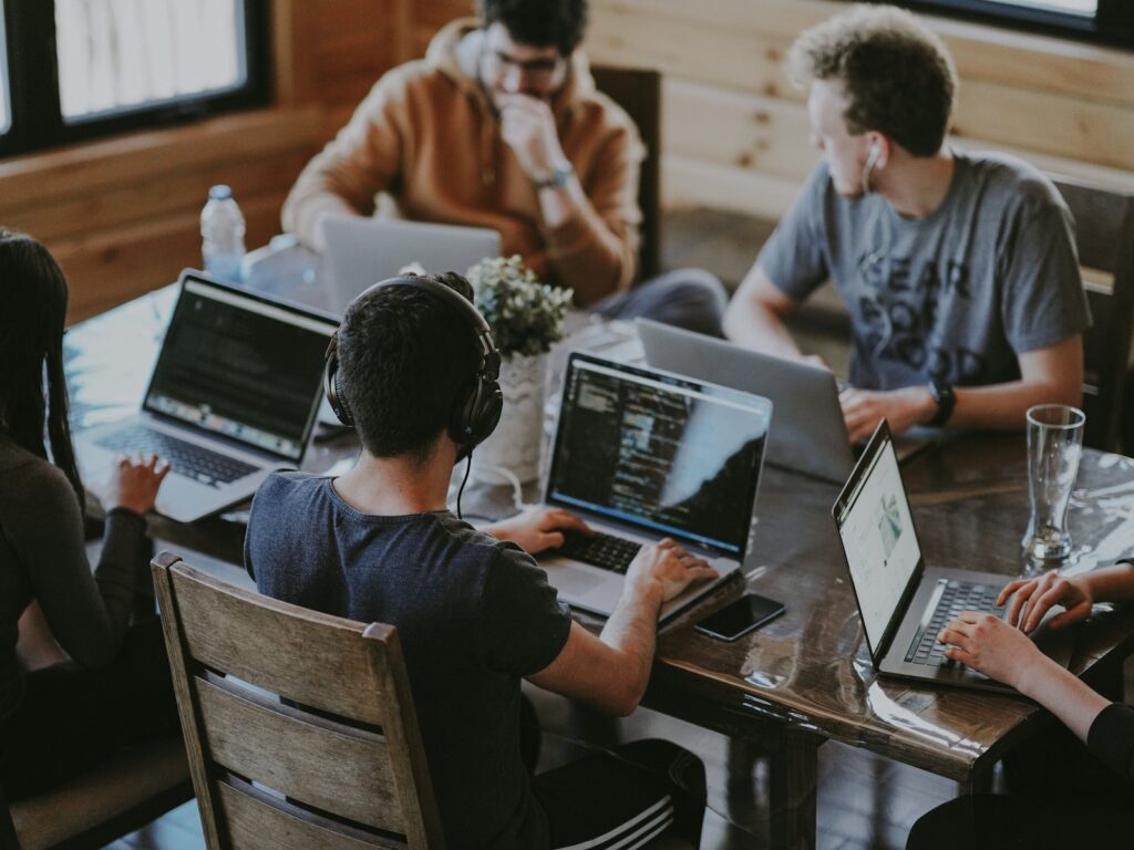 Group of colleagues learning together on a laptop