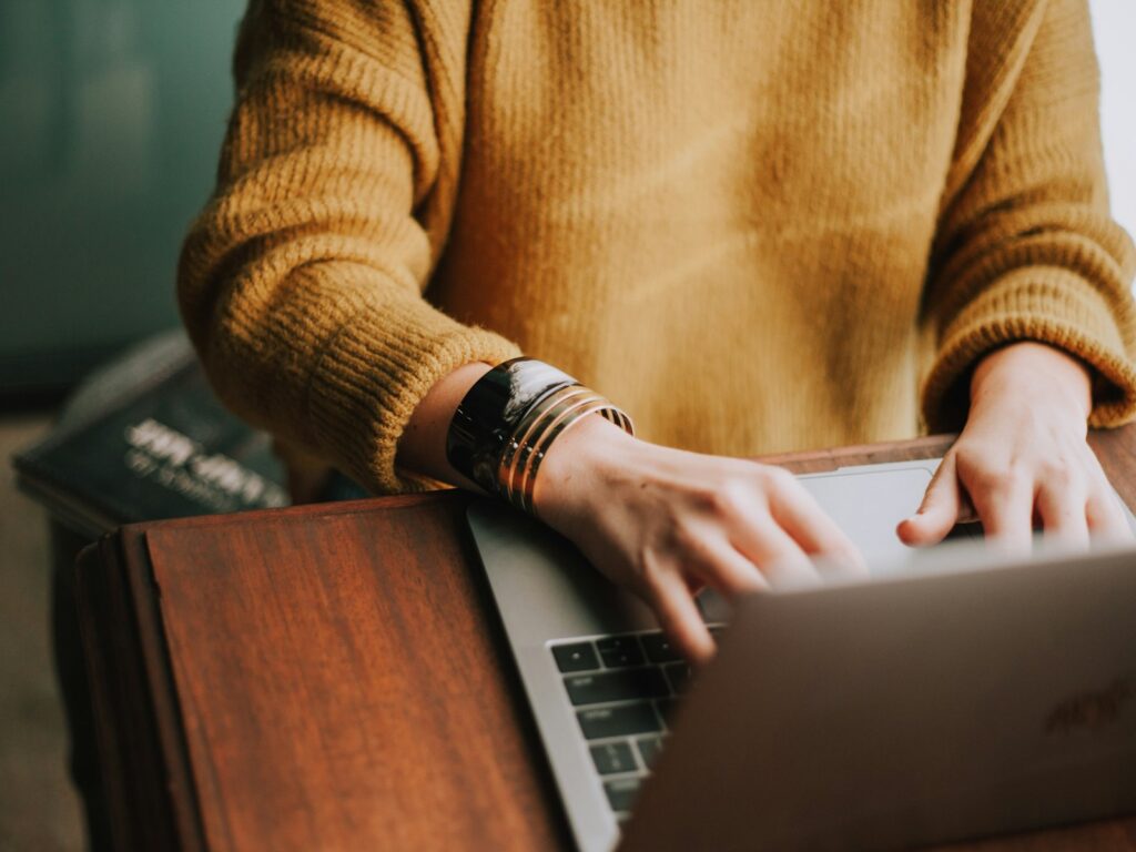 Person working on a laptop at home